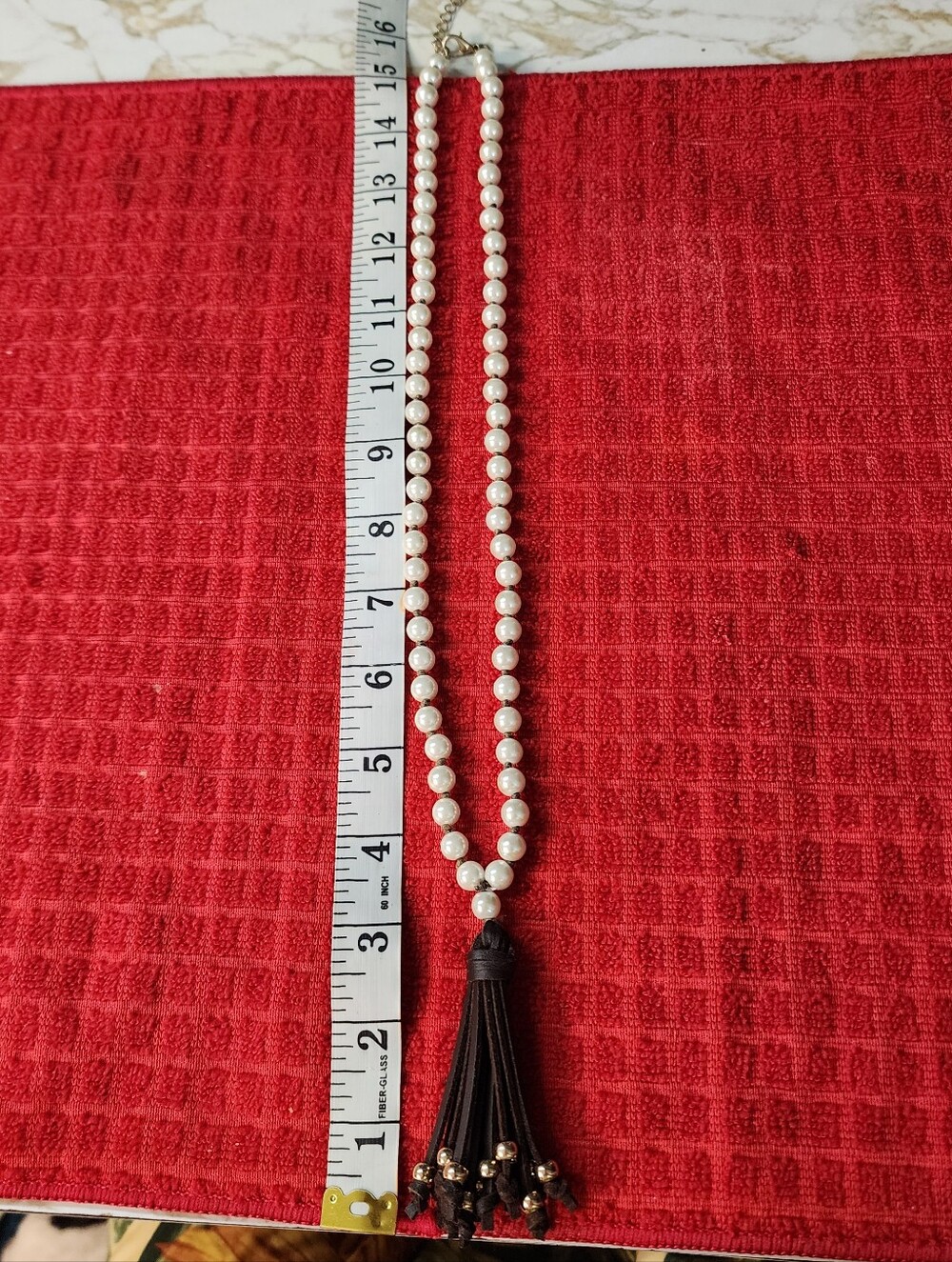 Pearl And Leather Necklace.